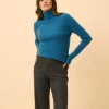 AVA pull col roulé paon