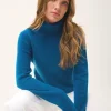 JUNE pull col roulé paon